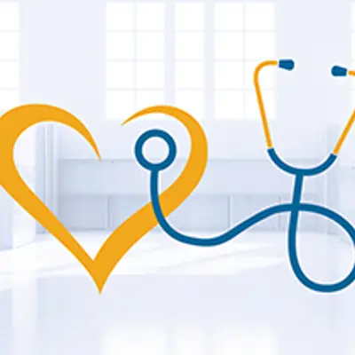 Stethescope and heart with empty school hallway as background